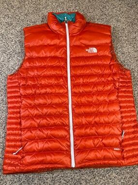 The North Face Orange Quilted Packable Down Vest with White Trim